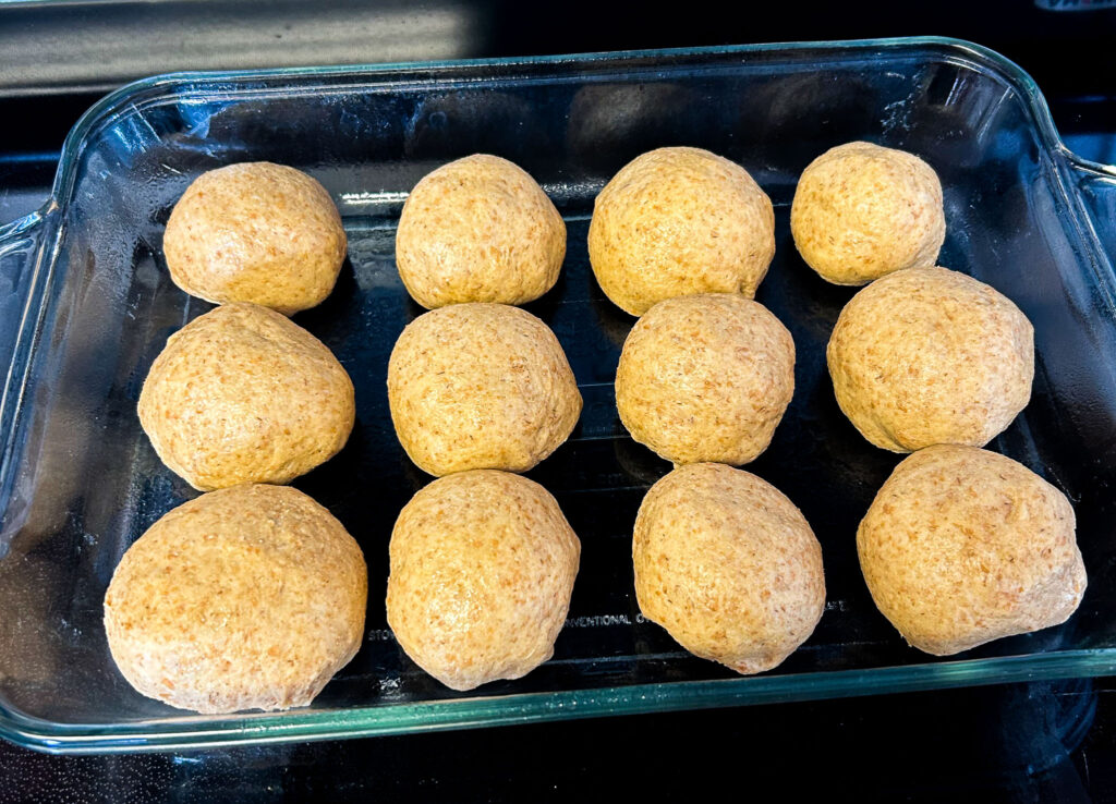 Formed dinner roll rough and placed in 9x13 banking dish right before rise